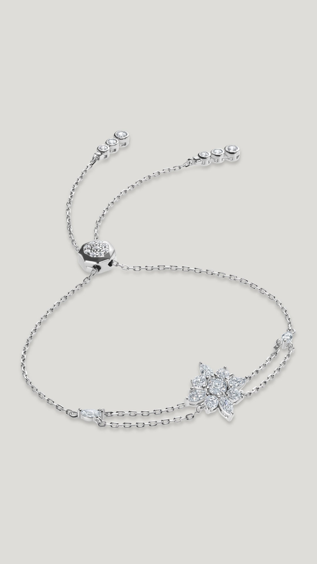 Camelia vintage inspired bracelet for wmoen in sterling silver with white gold plating.
