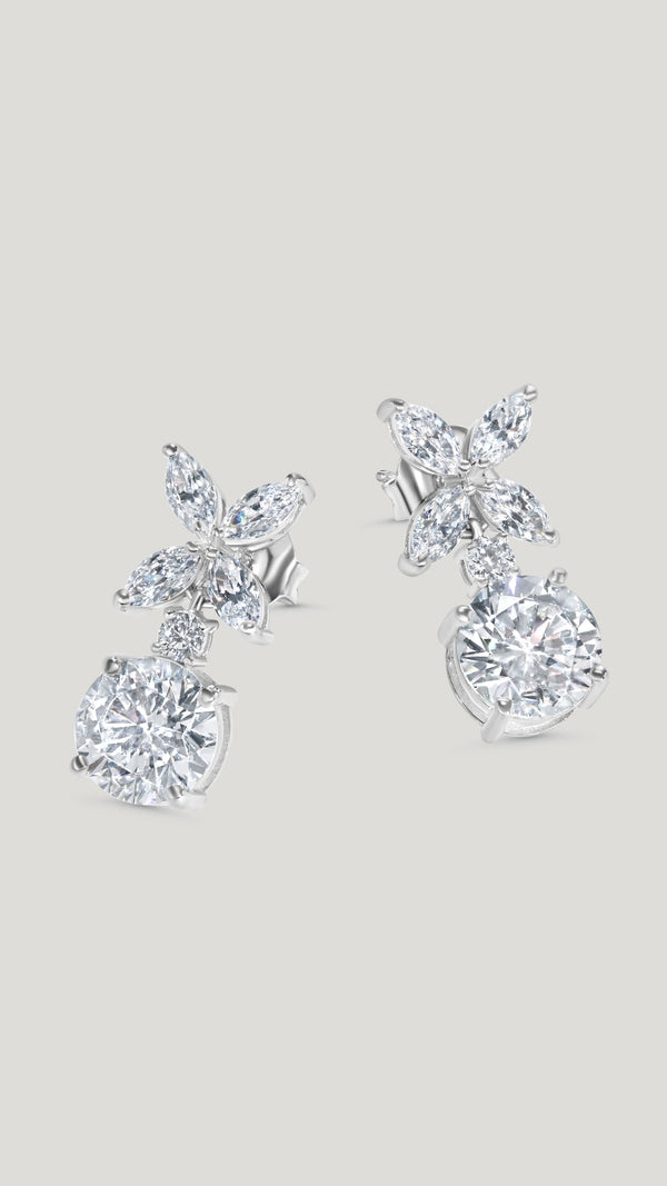 Womens drop earrings featuring Round Brilliant stones that wonderfully catch the light from every angle. 