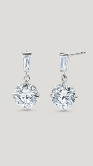 Drop earrings for women with step-cut baguettes and precision-cut round brilliant stones.