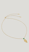 Tropical palm leaf necklace for women featuring an emerald stone. 18k gold vermeil on sterling silver necklace.
