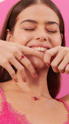 Dark pink lab-grown gemstone with sugarloaf cut on gold vermeil station necklace and gold vermeil ring for women from the sugardrop collection