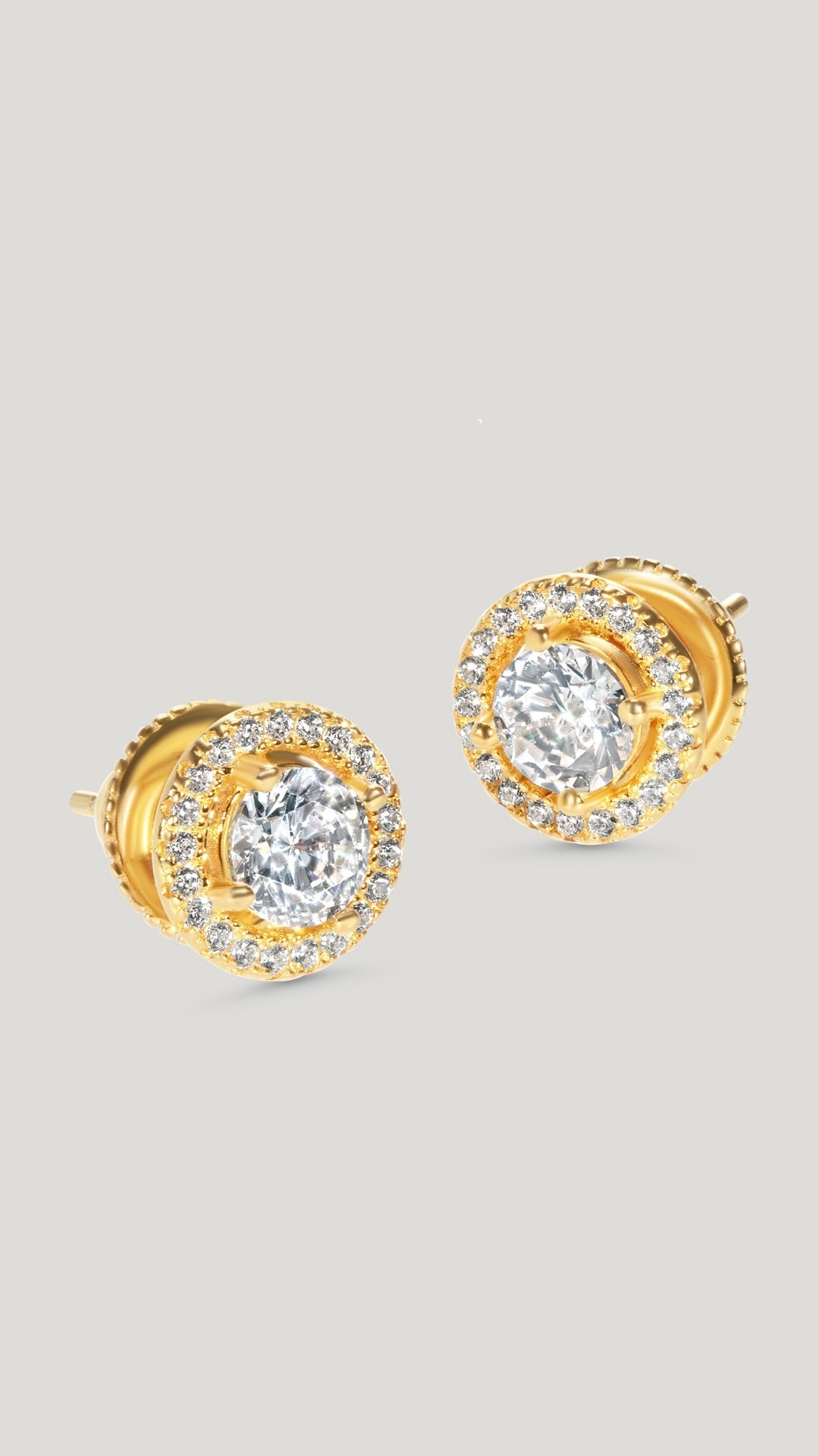 These Gwen stud earrings feature our intricately cut and polished Round Brilliant centre stone encased in a scintillating border setting to give the ultimate sparkle.