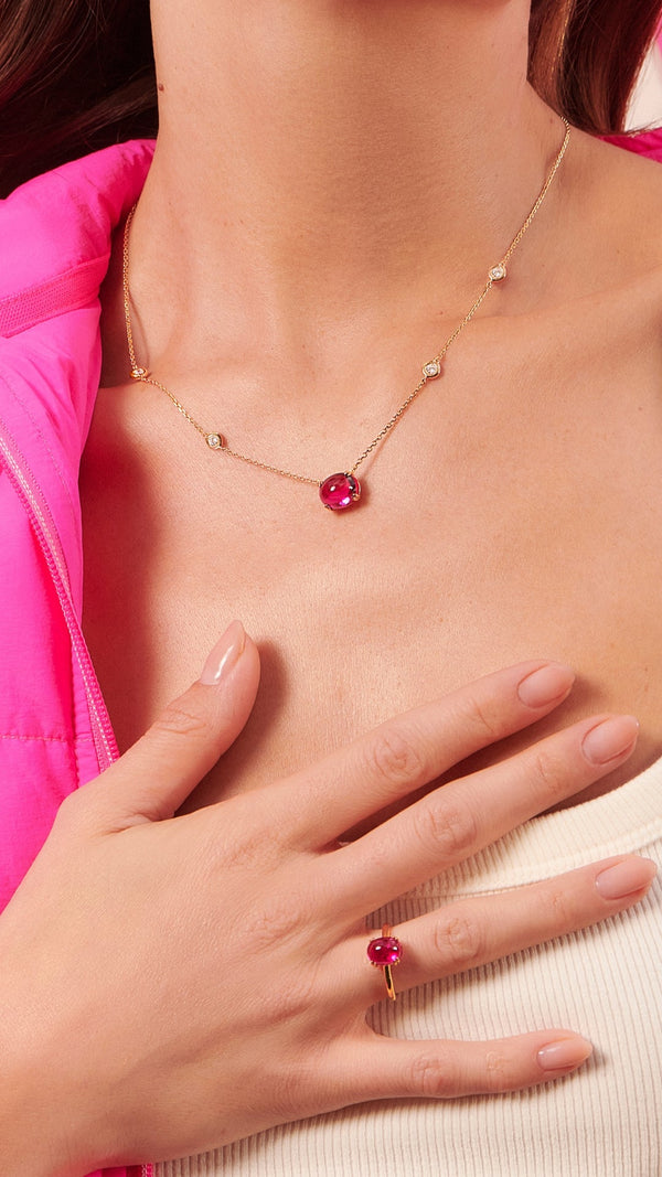 Lab-grown dark pink cabochon stone on a gold vermeil station necklace for women from the sugardrop collection