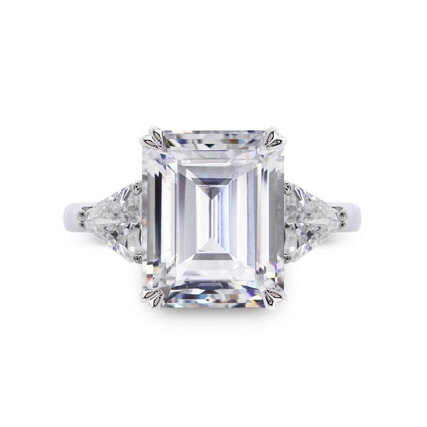 9K White Gold Trilogy Ring - 3ct Emerald Centre Stone, 2 Trillion Side Stones