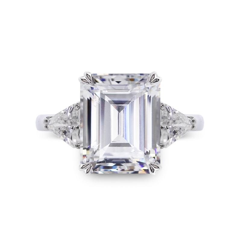 9K White Gold Trilogy Ring - 3ct Emerald Centre Stone, 2 Trillion Side Stones