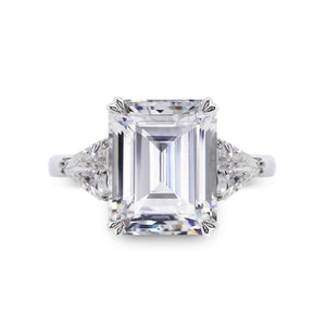 9K White Gold Trilogy Ring - 3ct Emerald Centre Stone, 2 Trillion Side Stones