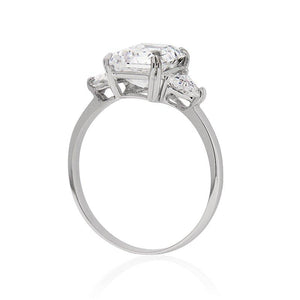 9K White Gold Trilogy Ring - 3ct Emerald Centre Stone, 2 Trillion Side Stones